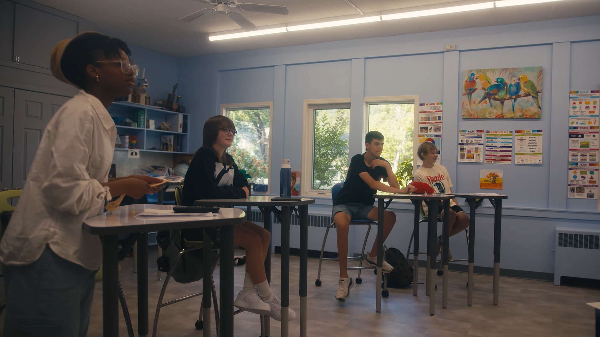 High school students watching a lesson.
