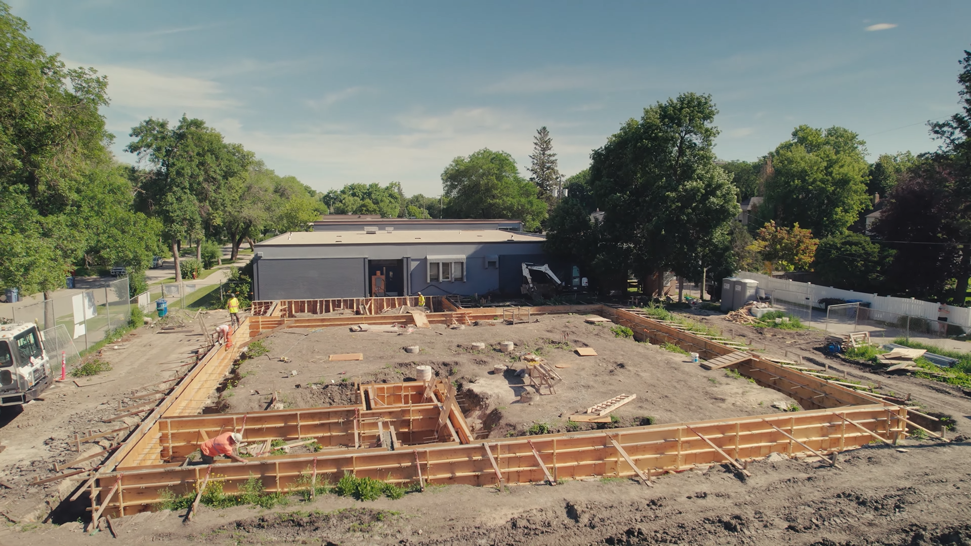High shot of construction foundation for high school expansion.
