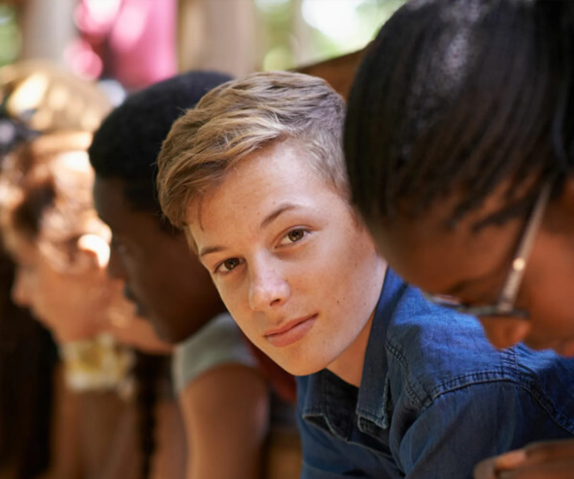 high school boy looking at camera
